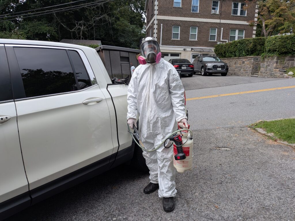 Bed Bug Treatment in Westchester County, NY 1 Bed Bug Treatment in Westchester County NY technician preparing for service